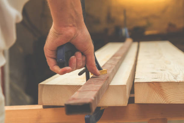 istock Carpenter working in his small 