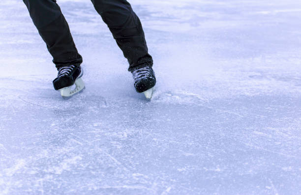 istock A man riding on the open ice-skating. 646397910