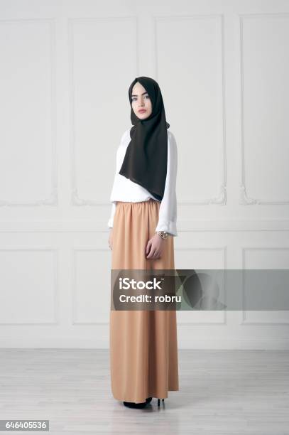 Modern Islamic Muslim Woman In Fashionable Dress In Full Growth Stock Photo - Download Image Now
