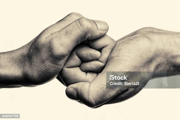 Connected Together And Forever Stock Photo - Download Image Now - Hand, Black And White, Holding Hands