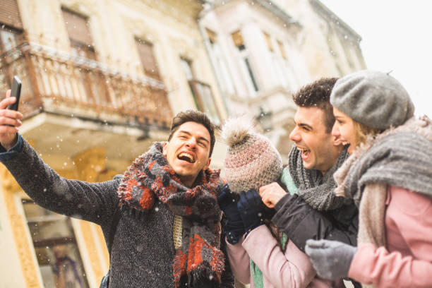 istock Friends photographing themselves on smartphone 646409896