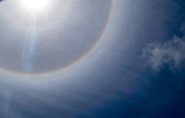 istock fantastic beautiful sun halo phenomenon in thailand 646411330