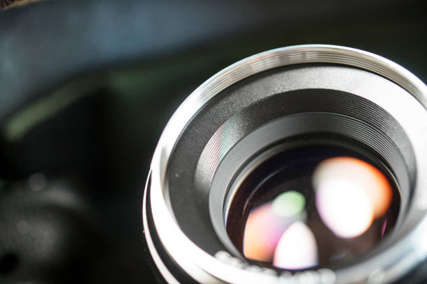 istock camera lens in photographer's bag 646418238