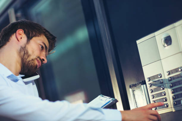 istock Businessman outside the office building 646421348