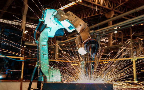 istock Industrial robot is welding in factory 646438578