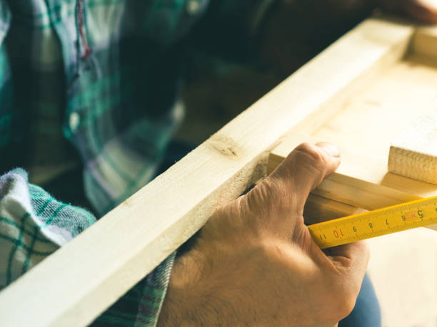 istock Man crafting wooden object with hands. Lifestyle process 646452344