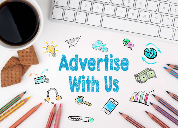 istock Advertise With Us, Business concept. White office desk 646463038