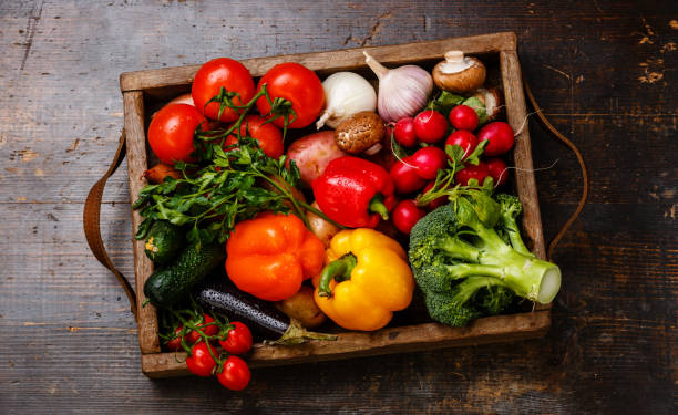 istock Fresh vegetables in wooden box 646475648