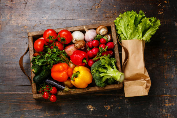 istock Fresh vegetables in wooden box and lettuce 646475650