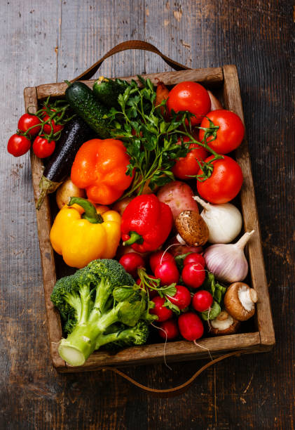 istock Fresh vegetables in wooden box 646475652