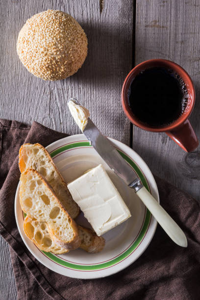 istock French baguette with butter for breakfast 646478948
