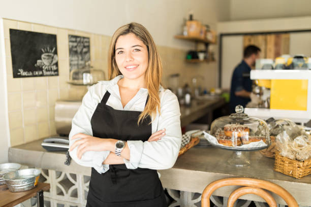 istock Beautiful Hispanic coffee shop owner 646483854