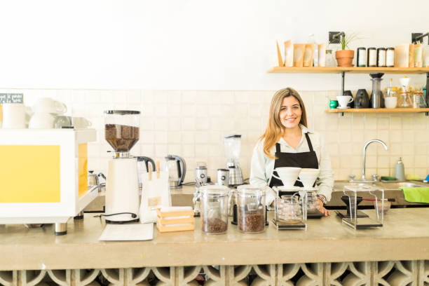 istock Beautiful barista in a coffee shop 646486744