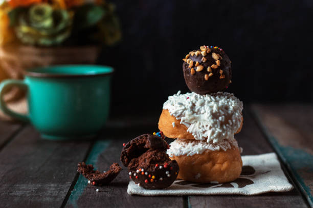 istock Donuts and chocolate on the wooden. 646492362