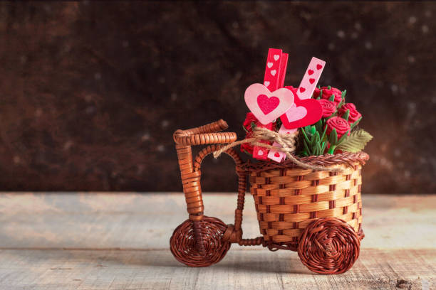 istock Hearts and rose on wooden. 646492390