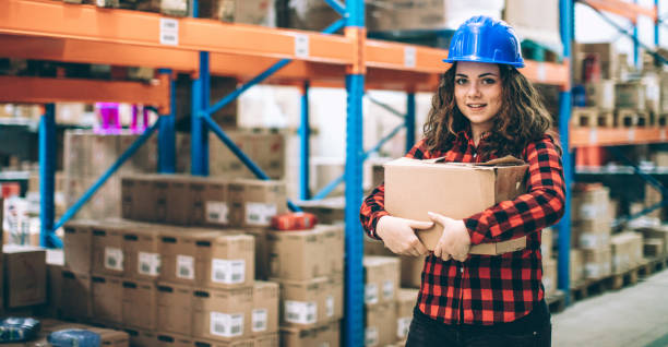 istock Woman working in warehouse 646494356
