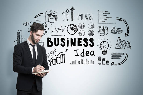 istock Man with paper, business idea, gray wall 646494796
