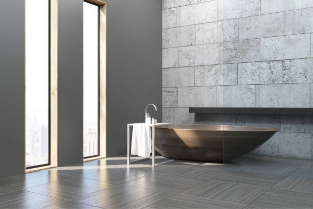 istock Side view of old bathroom with concrete walls 646501370
