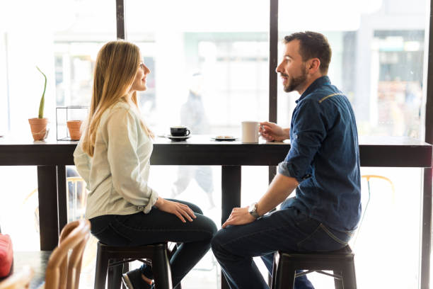 istock Couple dating in a coffee shop 646505636