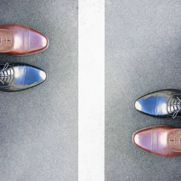 istock Border line and top view perfect kept different business shoes. 646505660