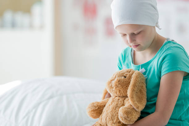 istock Cancer Patient Sitting with Her Stuffed Animal 646506700