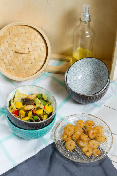 istock Asian food with vegetables and shrimps. 646520468