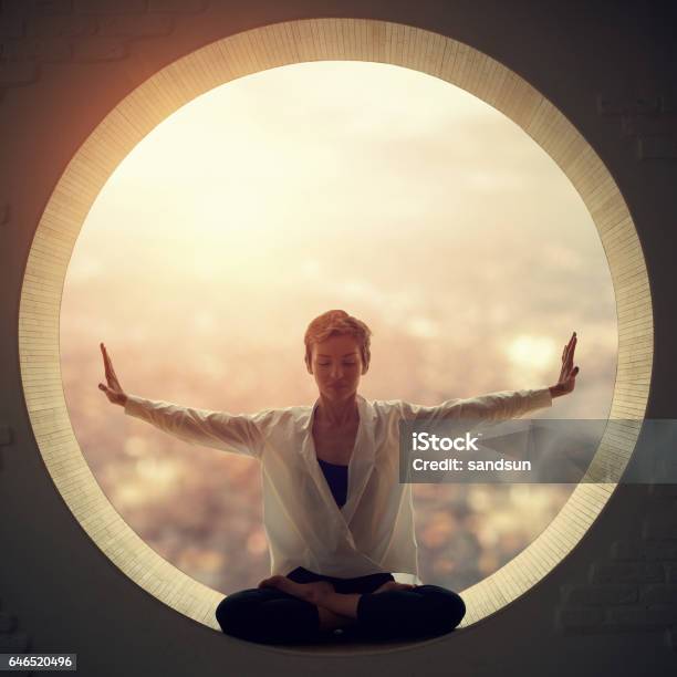 Young Woman Doing Yoga Stock Photo - Download Image Now - Circle, Spirituality, People