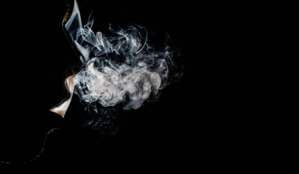 Attractive young girl and white smoke.