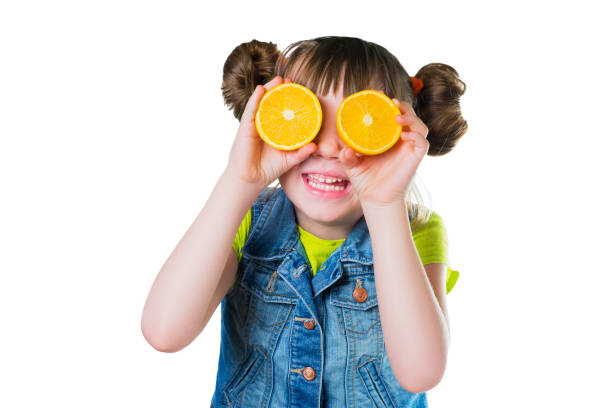 istock Baby a smile and orange on white background 646537640