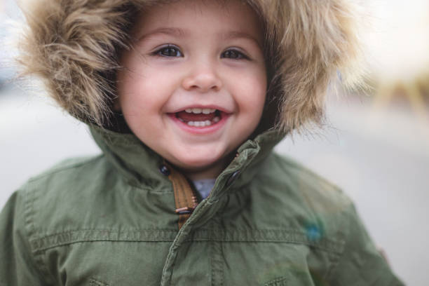 istock Baby girl smiling close up 646540830