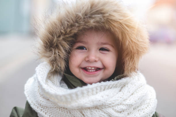 istock Winter beauty with cute toothy smile 646540872