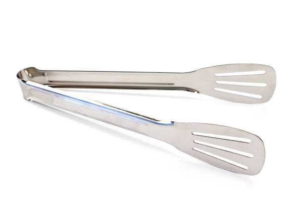 istock Serving kitchen tongs isolated on  white 646554180