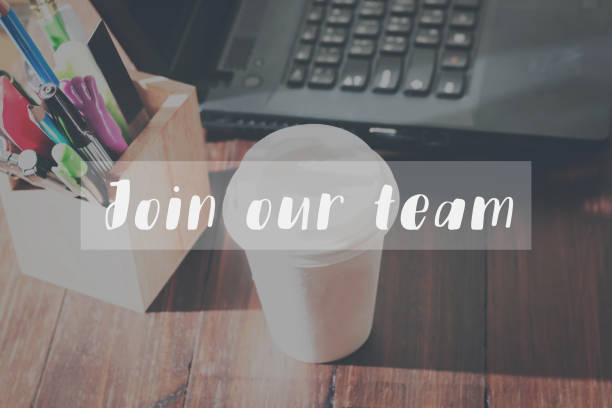 istock Concept join our team message on the device works the table background 646555706