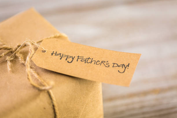 Wrapped in brown paper gift stock photo