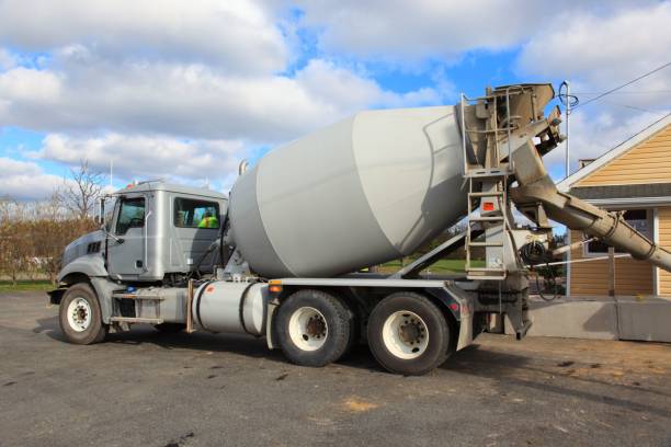 istock Cement truck at a job site, construction equipment 646565108