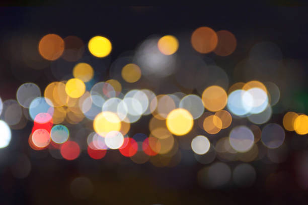 istock Night city street lights bokeh background 646580318
