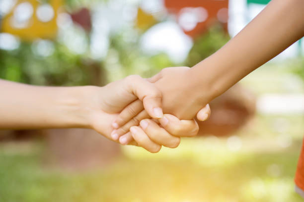 istock Happy couple holding hands in the sunset 646588594