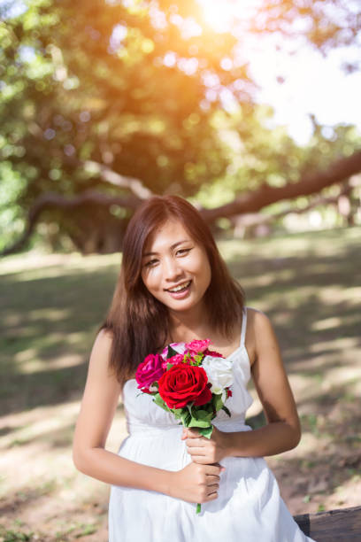 istock Flowers in woman hand 646597084