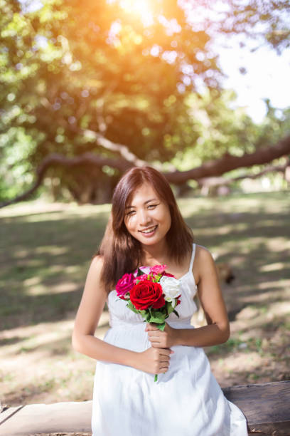 istock Flowers in woman hand 646597094