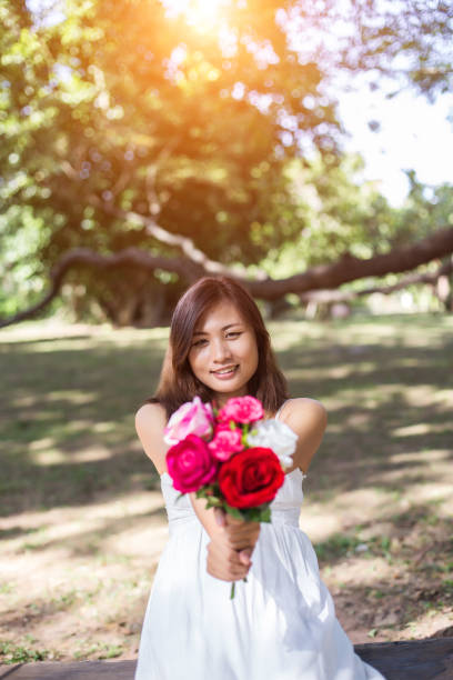 istock Flowers in woman hand 646597622