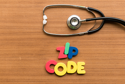 zip code colorful word with stethoscope on wooden background