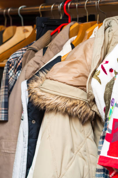 istock hanging various clothes in closet rack 646613614