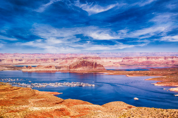 Lake Powell Photo taken of Lake Powell area, Page, Arizona. Many houseboats on the lake. glen canyon stock pictures, royalty-free photos & images