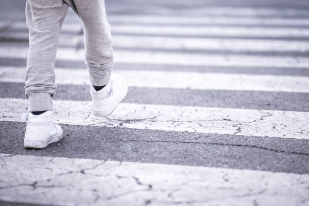 istock Child crossing the street 646655576
