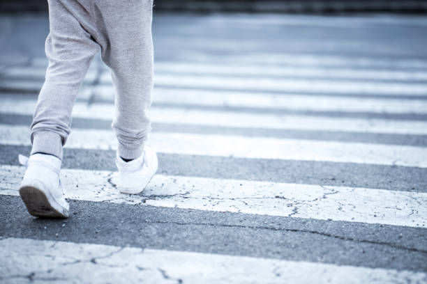 istock Child crossing the street 646655578