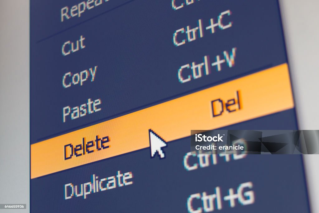 Software menu item with delete command Software menu item with delete command highlighted and mouse cursor selected it, macro shot File Folder Stock Photo