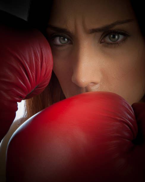 istock Girl in boxing gloves 646682146