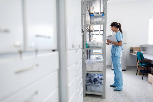 istock Woman working at a pharmacy doing inventory 646686572
