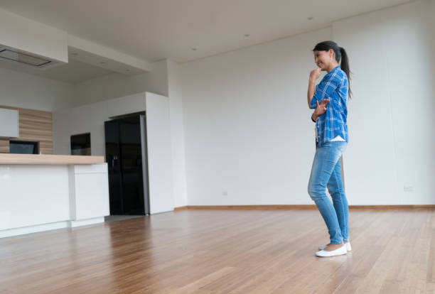 istock Thoughtful woman at an empty apartment 646687458
