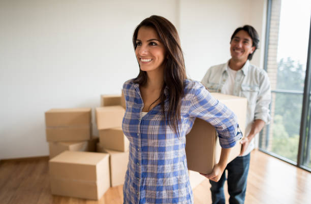 istock Happy couple moving house 646688530